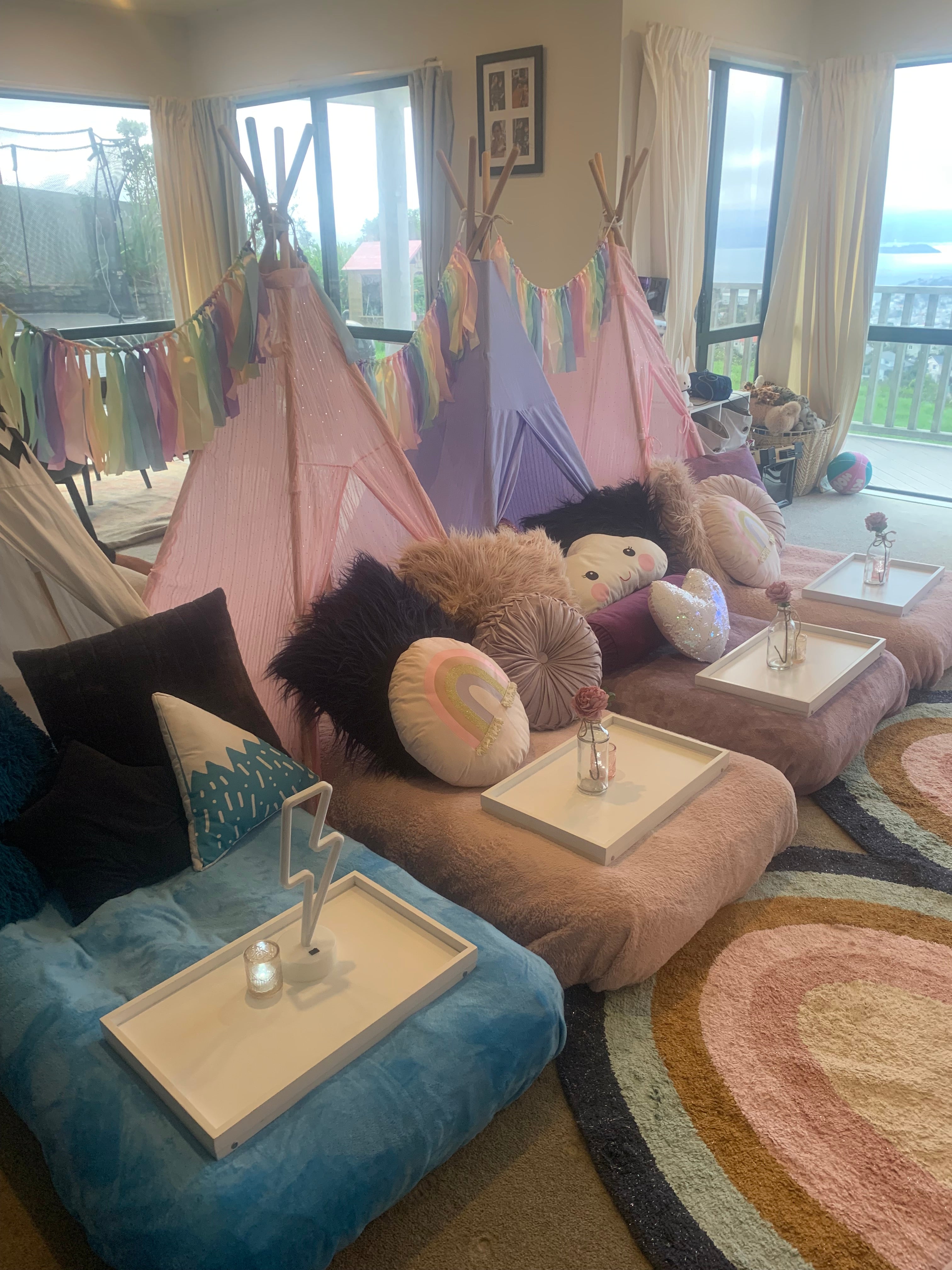 Boutique teepee co Wellington with it's gorgeous over the rainbow pastel themed teepee sleepover party hire