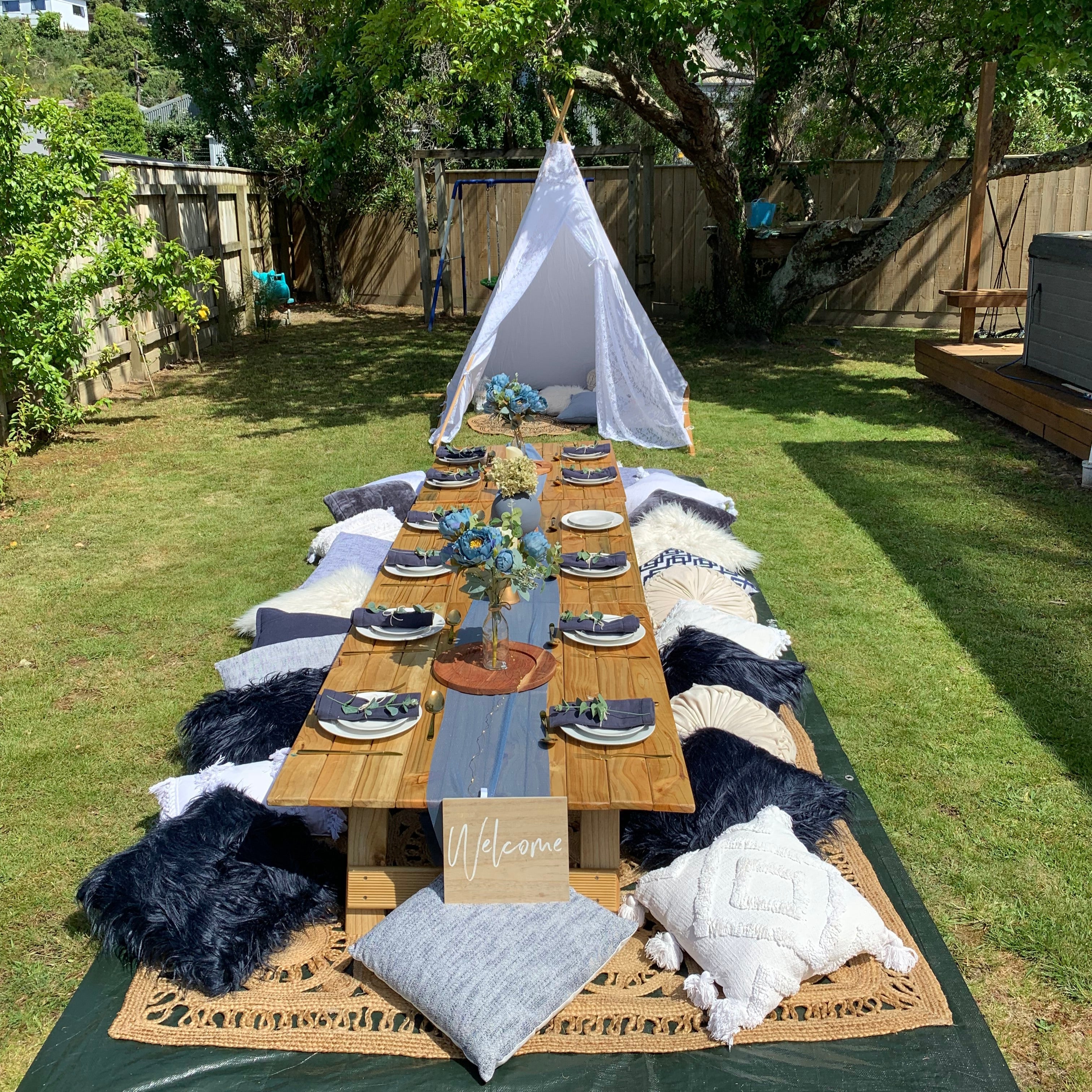 Blue boho luxury picnic setup Wellington