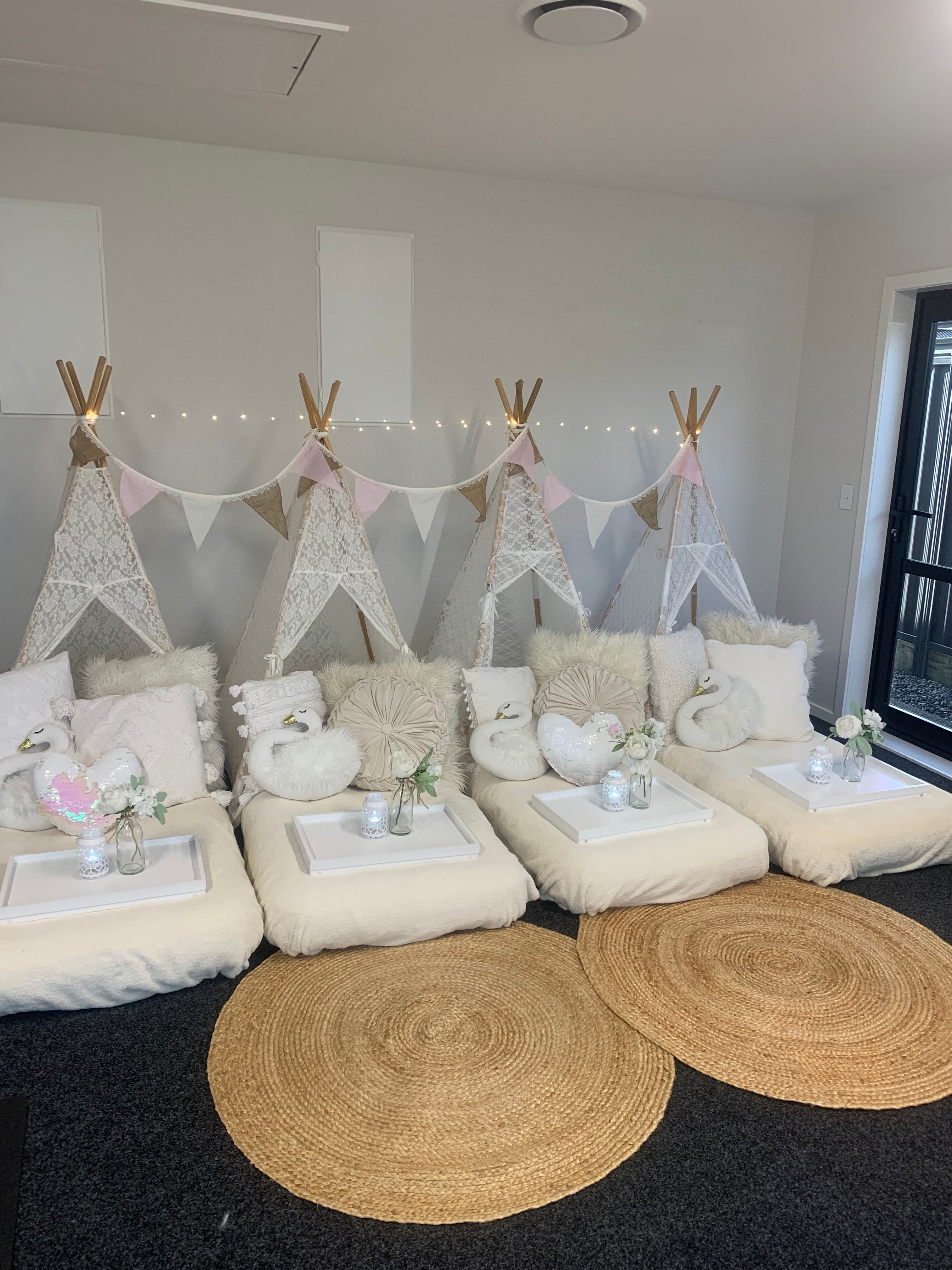 Gorgeous creams and swans in our luxurious teepee party hire in Wellington