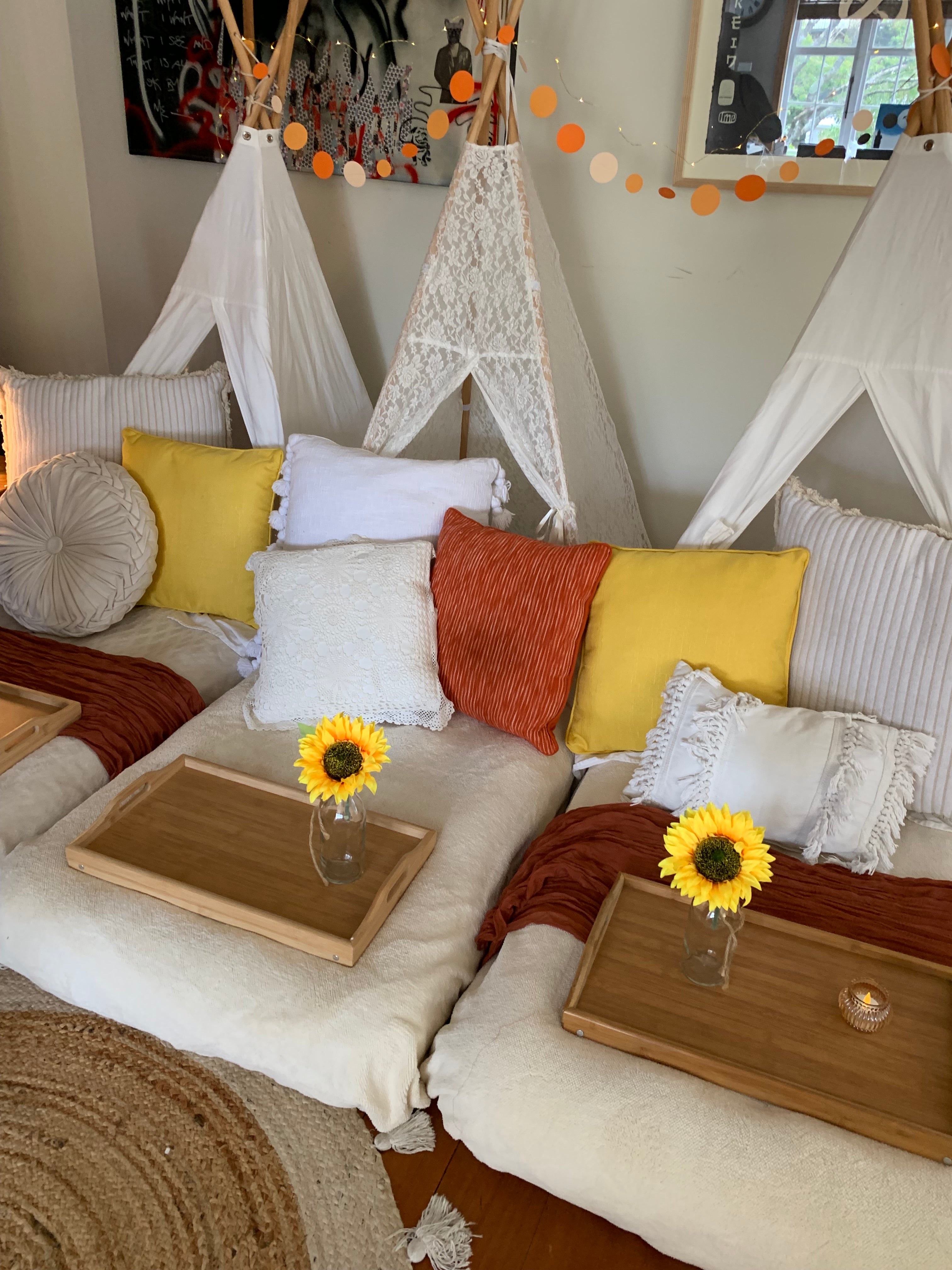 Yellow and orange themed teepee party Wellington